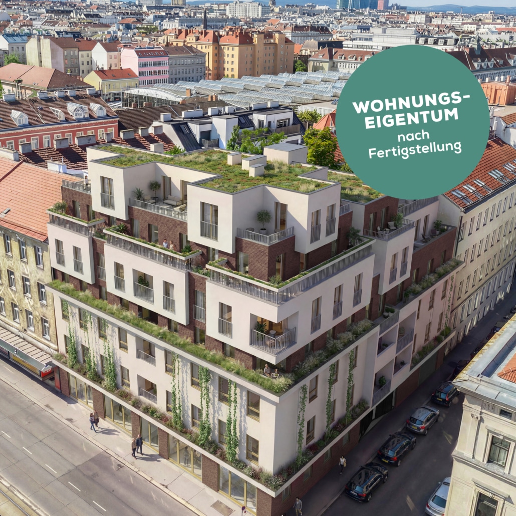 Man sieht ein saniertes Haus mit heller Fassade und braunen Elementen. Das Dach ist begrünt.